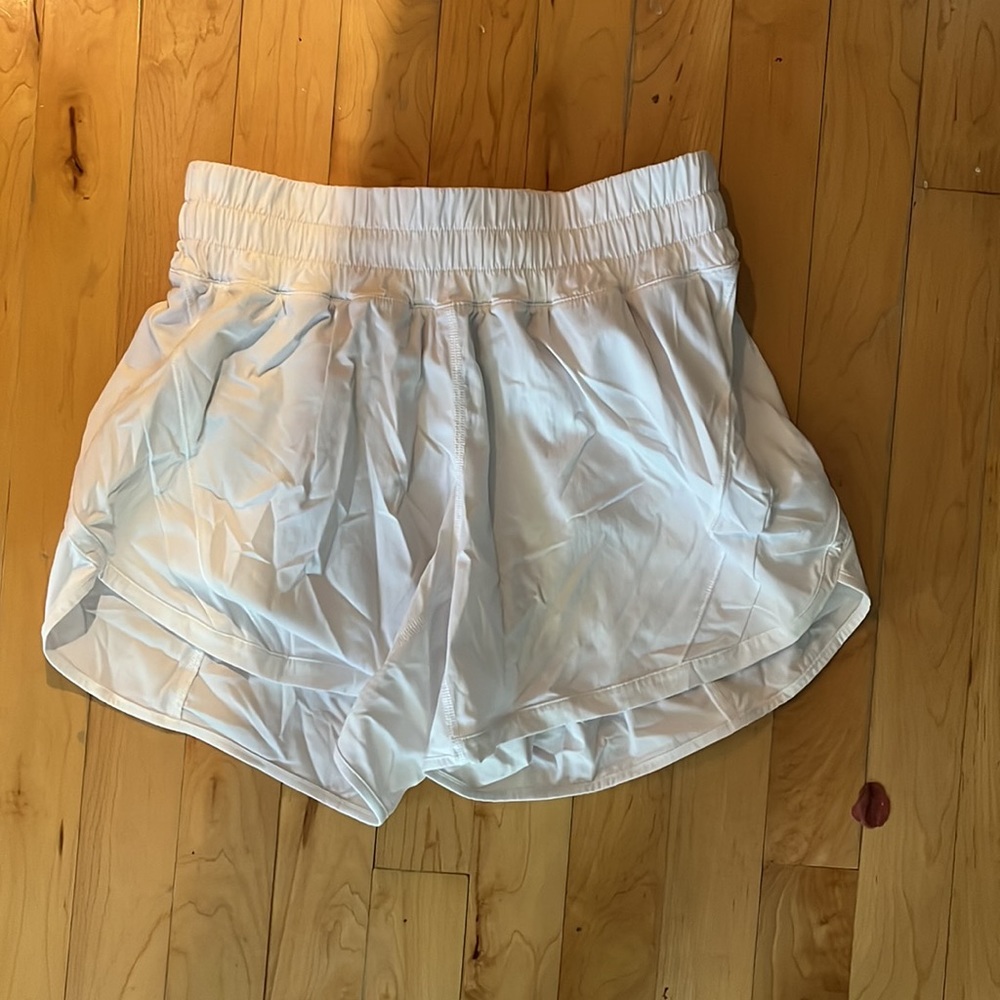 Selling size 6 white lululemon shorts